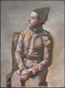 Pablo Picasso, Arlequin assis